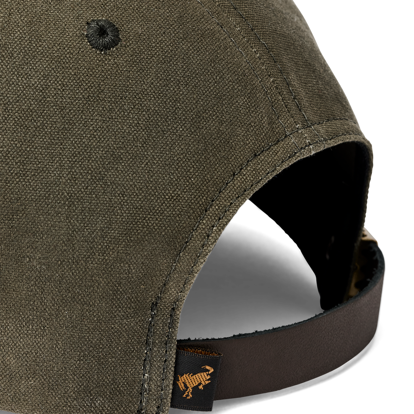 close up of a green hat with a brown leather strap and a brono tag