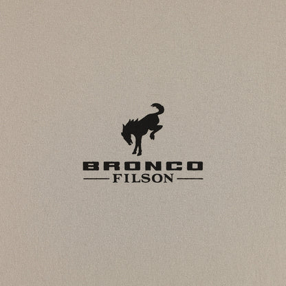 Bronco Filson logo on a beige background