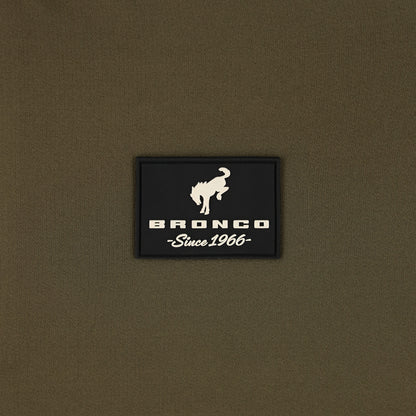 close up of a Bronco since 1966 silicone patch on a green background