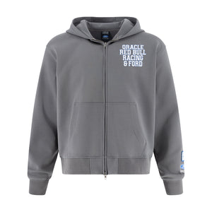 A gray zip-up hoodie with a white printed text graphic on the left chest reading 'ORACLE RED BULL RACING & FORD', shown against a plain white background.