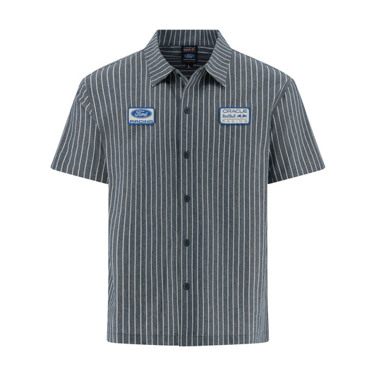 A short-sleeve button-up shirt with thin vertical white pinstripes on a dark gray base, featuring two Oracle Racing patches on the chest, one blue Ford logo patch and one Oracle logo patch.