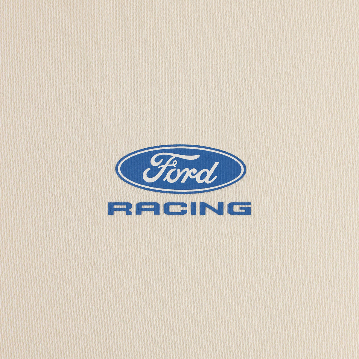 A blue Ford Racing logo decal centered on a textured off-white fabric background.
