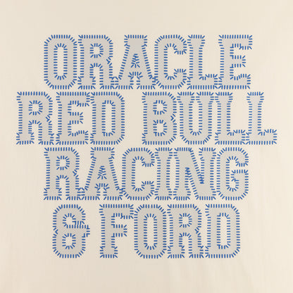 A graphic print featuring the text 'ORACLE RED BULL RACING & FORD' in stylized blue block letters with a stitched or dotted texture, set against a solid light beige background.
