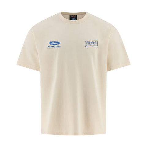 A cream-colored short-sleeve t-shirt featuring a blue Ford Racing logo on the left chest and a circular Track of the Americas Racing logo on the right chest, displayed on a clean white background.
