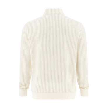 A cream-colored ribbed knit sweater with a mock neck and cuffed sleeves, shown from the back on a solid white background.