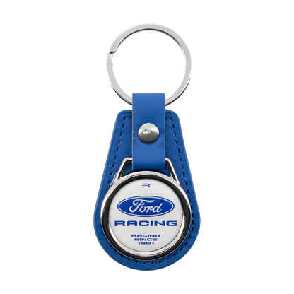 A blue leather keychain featuring a circular silver-tone metal emblem with the Ford Racing logo and text, attached to a silver split ring and blue strap on a white background.