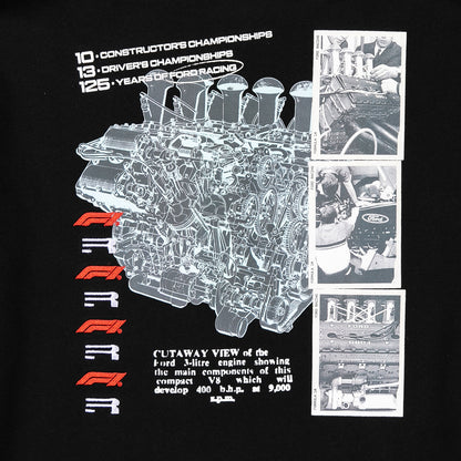 A black graphic t-shirt featuring a detailed white line-art cutaway illustration of a Ford V8 engine, accompanied by text celebrating Ford Racing championships and a vertical column of black-and-white historical photos on the right side.