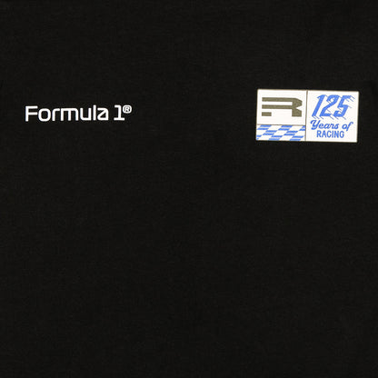 Black fabric surface with white 'Formula 1' text on the left and a small white racing patch reading '125 Years of RACING' on the upper right.