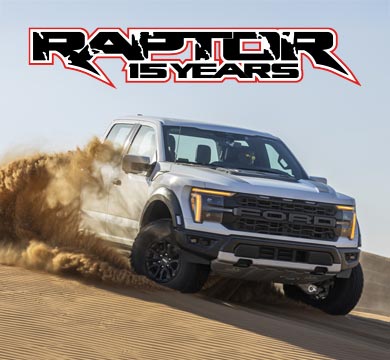 ford raptor racing down sand dune with raptor 15 years logo 