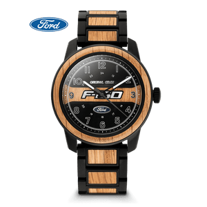 Wooden watch with black strap and visible Ford F-150 logo on a dark background