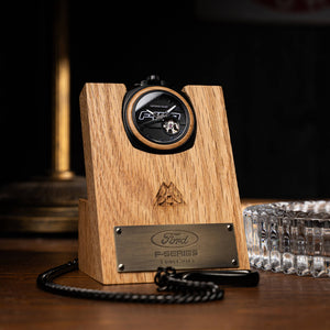 Wooden clock with Ford F-Series logo on a dark background